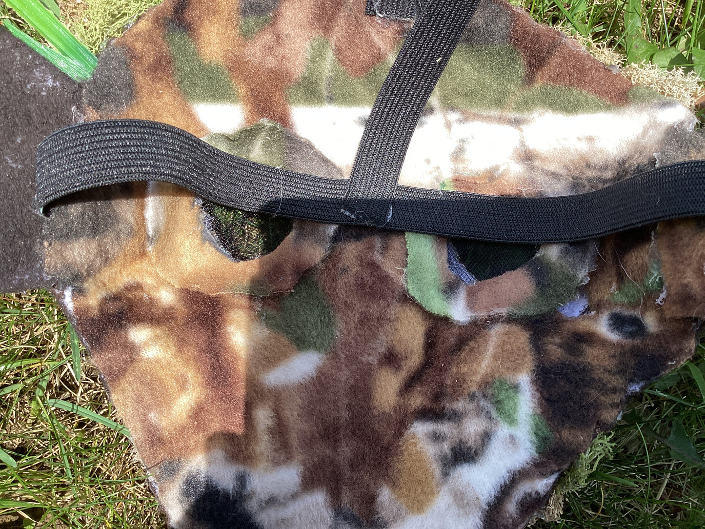 Axis deer therian mask with moss on it